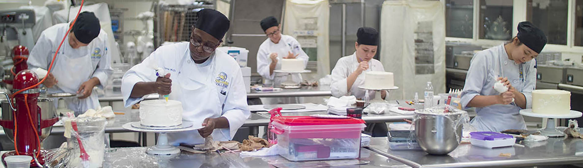 Culinary Arts students preparing cakes